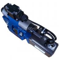 4WRTE10V50L-4X/6EG24K31/A1M - Пропорциональный быстродействующий распределитель с обратной связью по положению золотника и со встроенным усилителем (OBE), Ду10, A1 = ±10 В, номинальный расход 50 л/мин, схема V, каналы управления X и Y = внешние